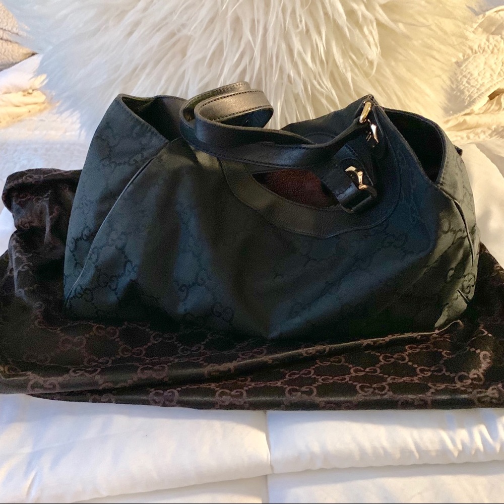 Authentic Gucci GG monogram nylon medium hobo bag.